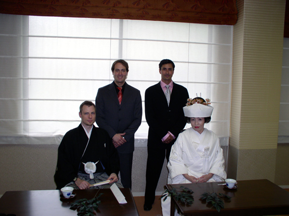 My friends Marcel(L) and Joe(R) standing. We're still sitting. In the sitting room.