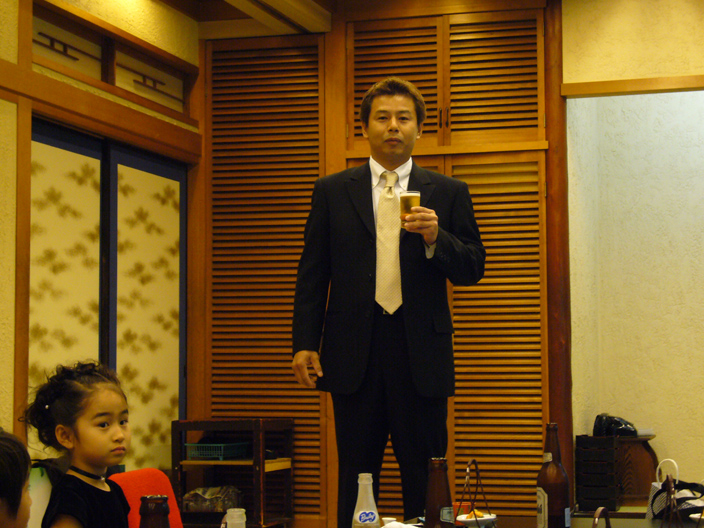 Yumi's brother-in-law giving a speech...