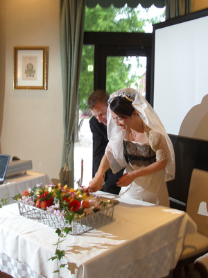 Cutting what I think was a cake.